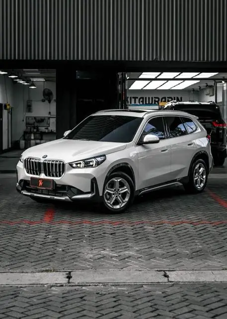 PPF Mobil BMW X1 warna Putih — Kitawrapin